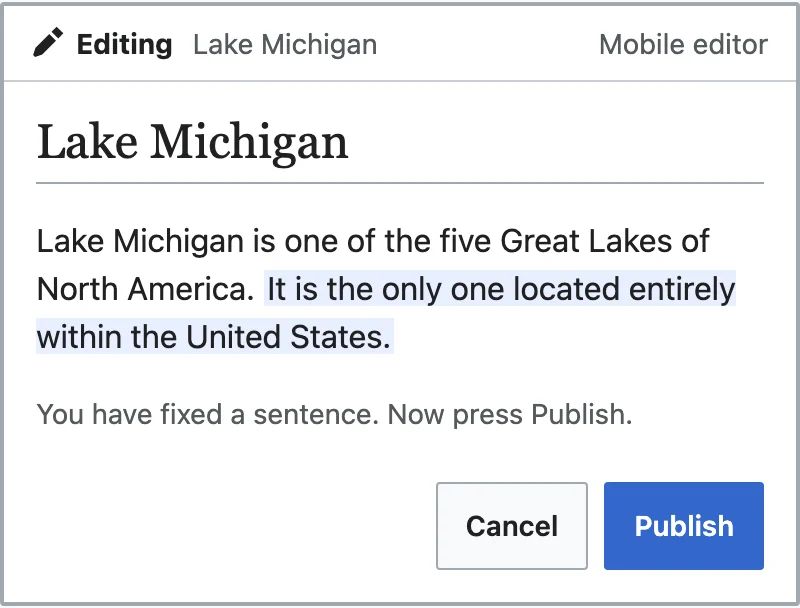 The mobile editor screen from the walkthrough. A newcomer has fixed one sentence in the Lake Michigan article, the changed words are highlighted, and Cancel and Publish buttons wait below.